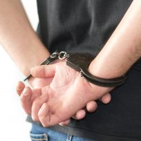 Hands in Handcuffs